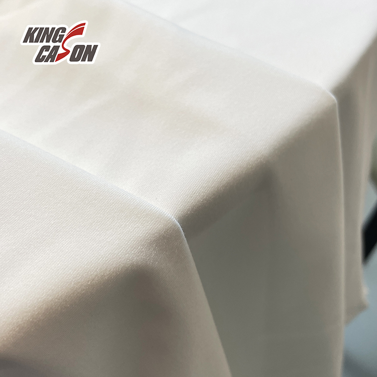 Kingcason Comercio al por mayor Tejido liso de punto de camiseta que absorbe la humedad